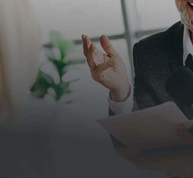 business man doing valuation with dark overlay