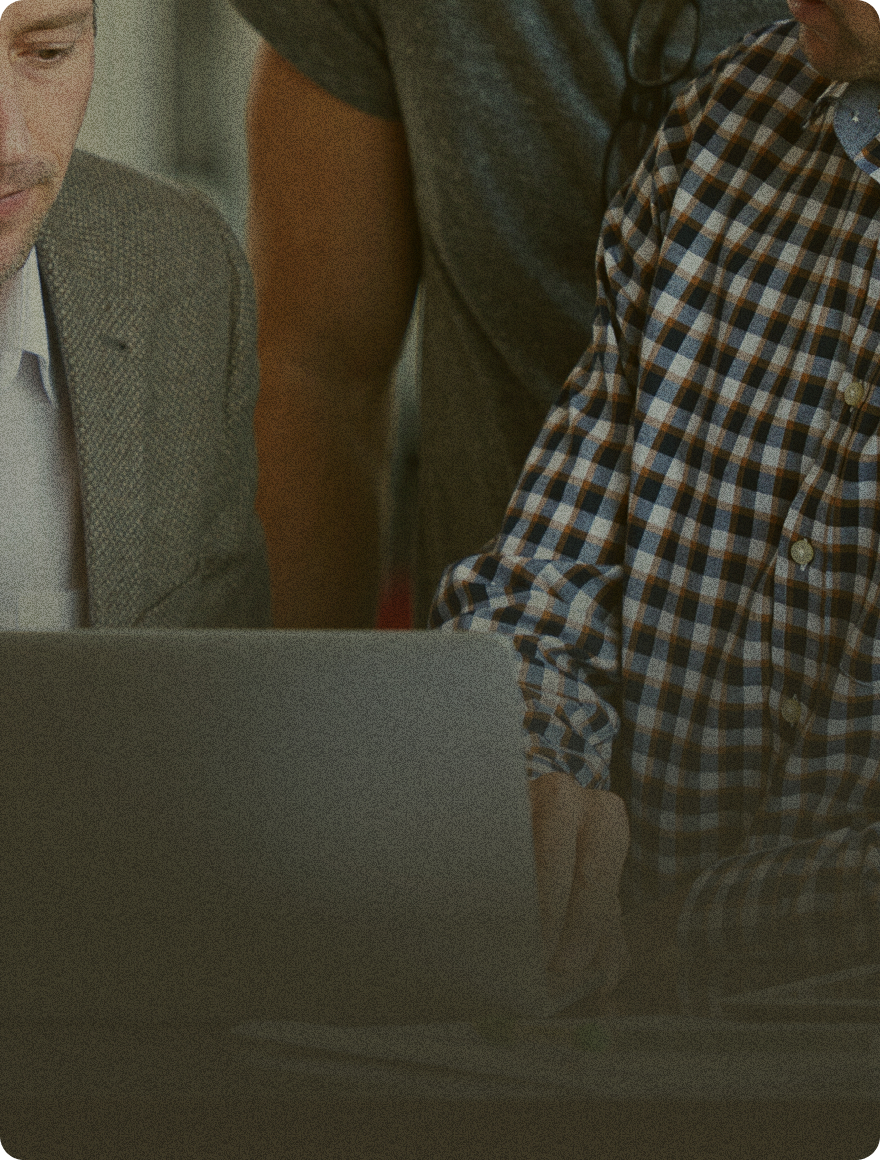 business man doing valuation with dark overlay